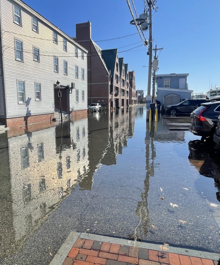 flooded streets on a blue sky day