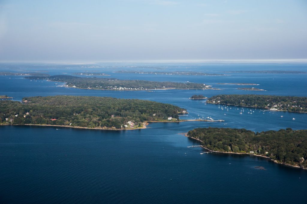 aerial photo of islands and blue water