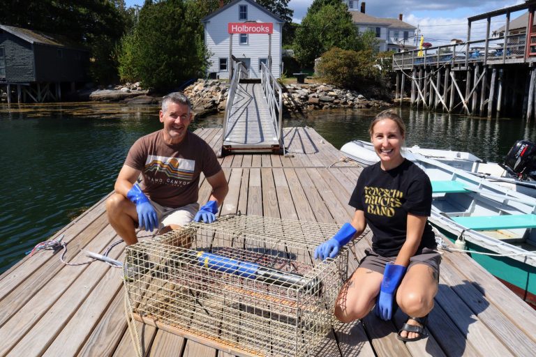 Mike and Heather at Harpswell CMS station dock with Cage of Science.