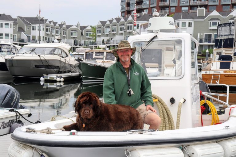 Our Pumpout Coordinator Andy and his big dog Wiggly on the Pumpout Boat. 2025 Season.